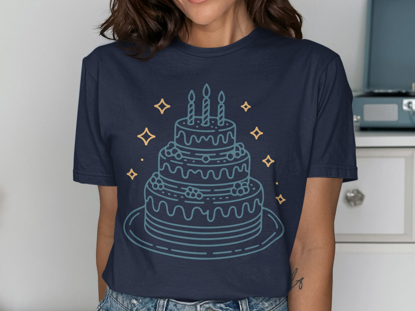 Blue Graphic Shirt Featuring a Birthday Cake